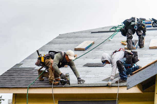Professional Roofing technician working in Tilton, NH